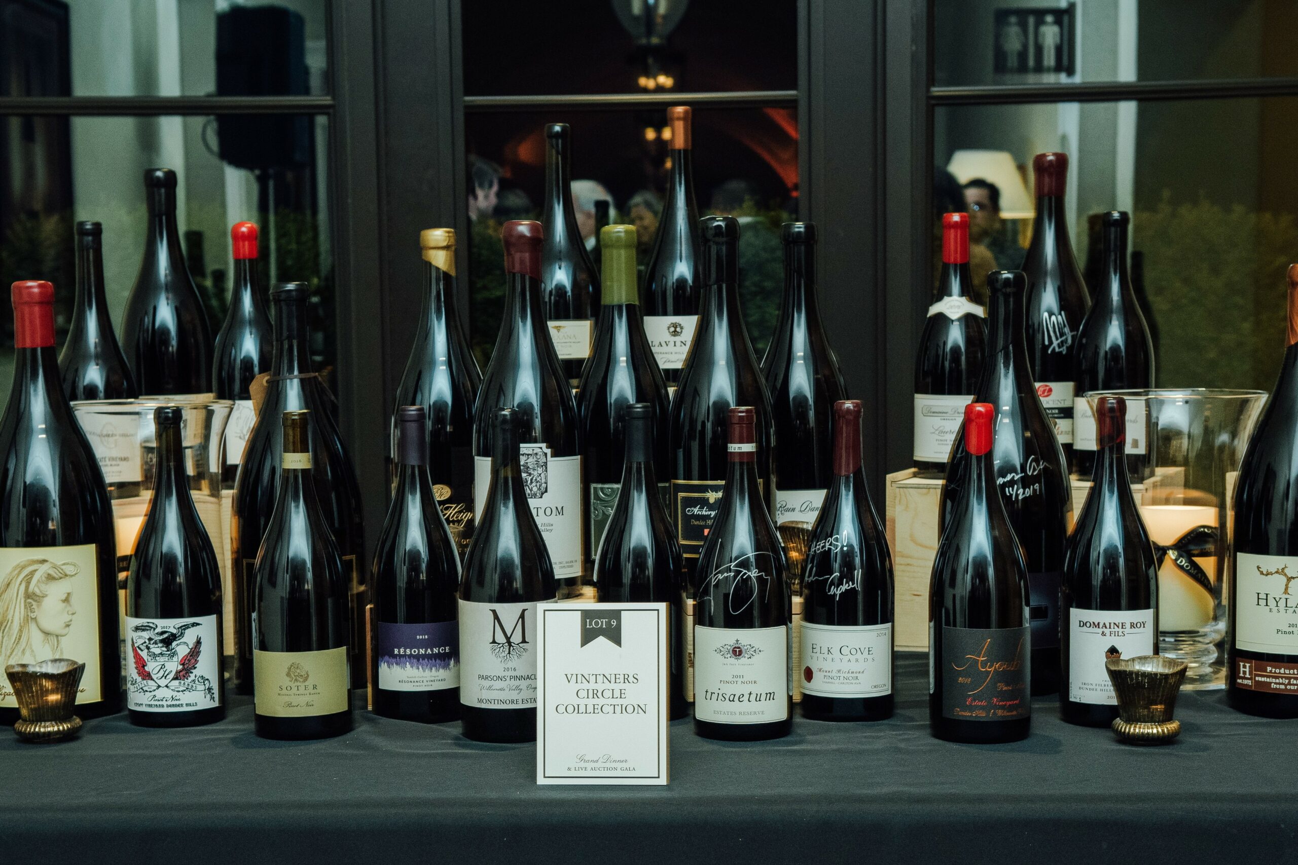 Bottles of wine gathered together and displayed as Lot 9 Vintners Circle Collection